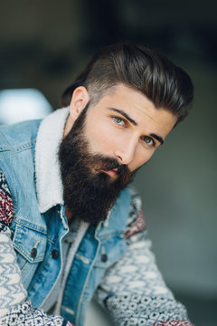 Handsome bearded man looking at the camera