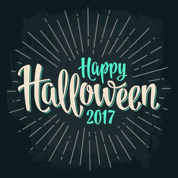 Happy Halloween 2017 calligraphy lettering. Bat flying with scary face