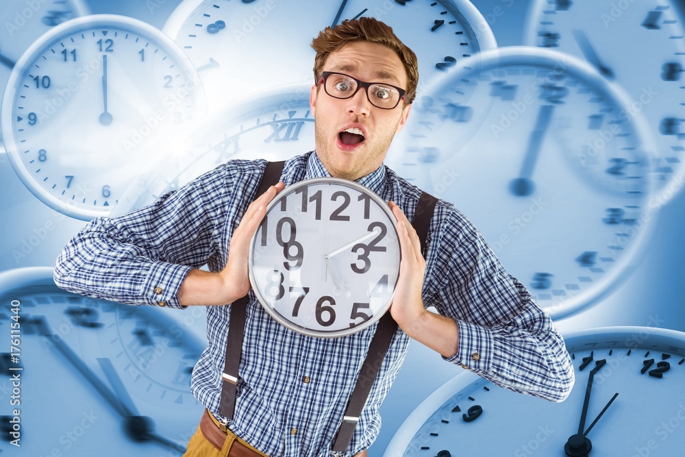 Poster composite image of geeky businessman holding a clock