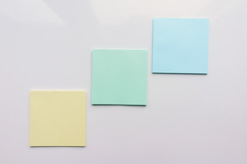 Three square sheet on a white background. Top view. Close-up