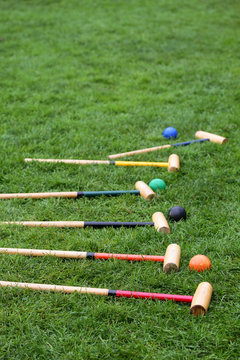 Vintage Croquet Equipment In A Green Lawn Ready For Play