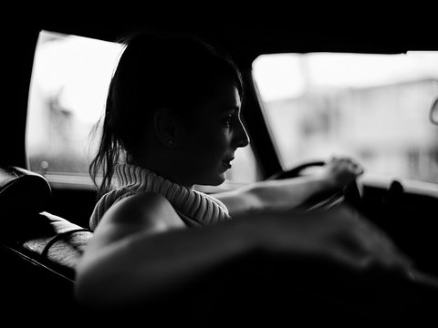 American muscle car with hispanic female