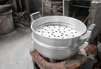 Stainless steel steamer pot on stove(original style Thai cooking)