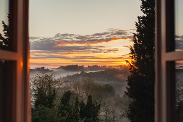 View from the window at sunrise in Tuscany