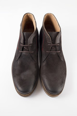 Male brown leather boot on white background, isolated product.
