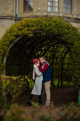 Beautiful pair of lovers walking in the autumn Park