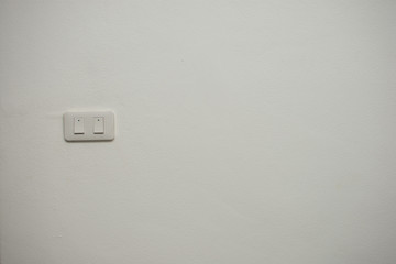 switch on the white wall