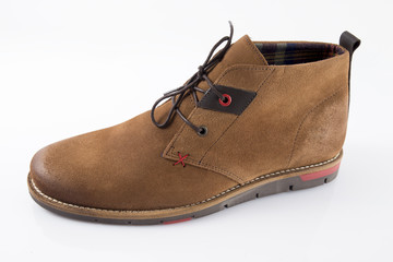 Male brown leather boot on white background, isolated product, comfortable footwear.