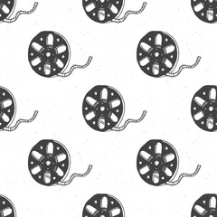 Cinema tape and film reel vintage seamless pattern, handdrawn sketch, retro movie and film industry, vector illustration