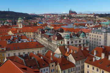Fototapeta na wymiar Autumn Palette: Prague Cityscape with Red Roof Houses