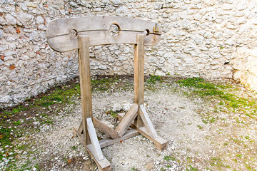 Wooden pillory on the castle Pilcza in Smolen (Poland)