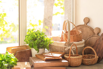 Different wooden boards on window sill in kitchen