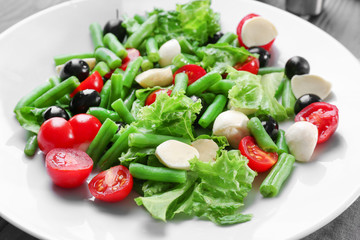 Plate of salad with green beans, closeup