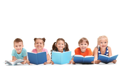 Cute little children reading books on white background