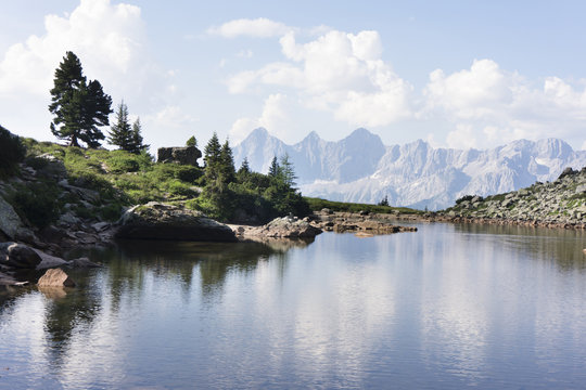 Lake Spiegelsee with mountain Dachstein on Reiteralm, austria