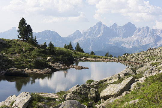 Lake Spiegelsee with mountain Dachstein on Reiteralm, austria