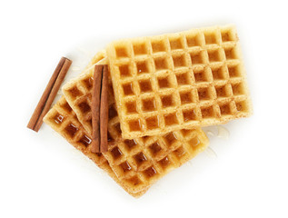 Delicious cinnamon waffles, isolated on white