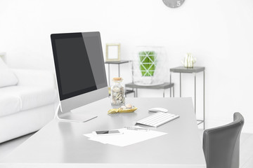 Comfortable workplace with modern computer on table