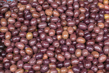Fresh brown olives closeup