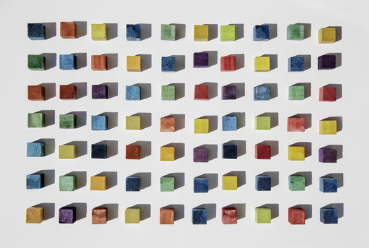 Colorful cubes geometrically arranged in a form of a rectangle