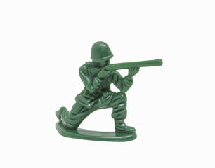 miniature toy soldier on white background; close-up