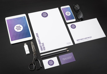 Tablet, Smartphone and Stationery on Dark Background Mockup 1