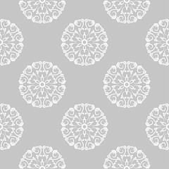 White flowers on gray background. Ornamental seamless pattern