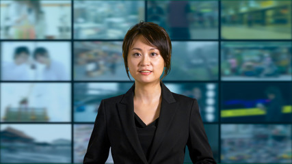Female news anchor in studio