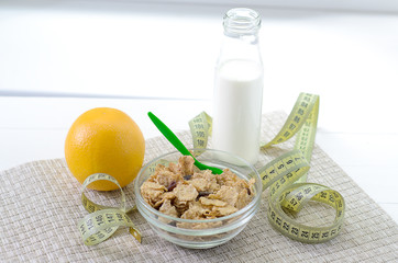 healthy eating, dieting, slimming and weigh loss concept - close up of diet plan paper green apple, muesli, green apple, kefir, milk