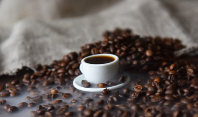 roasted coffee beans white Cup and saucer