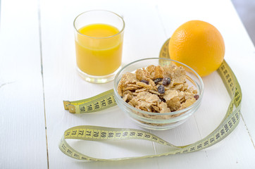healthy eating, dieting, slimming and weigh loss concept - close up of diet plan paper green apple, muesli, green apple, orange, juice