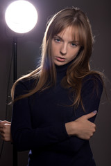 Fototapeta premium Portrait of a teenage girl with a backlight.