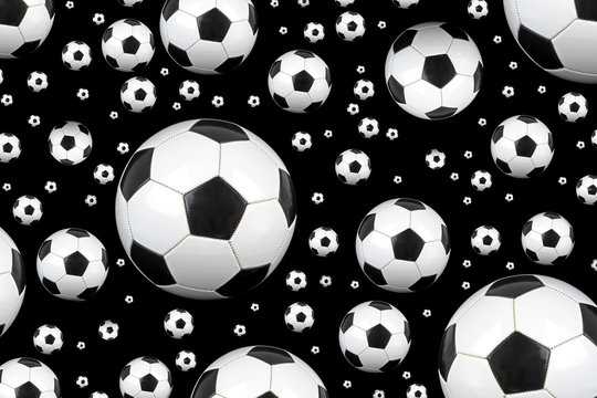 Soccer balls on black background.