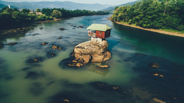 cottage on the rocks in the river Drina