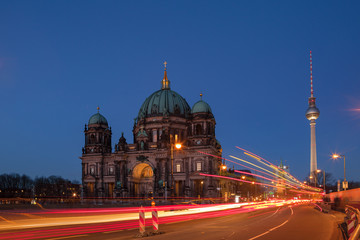Fototapeta na wymiar BERLIN, GERMANY - FEBRUARY 22, 2017: Night city traffic over Berlin Cathedral (Berliner dome). Long exposure shot.