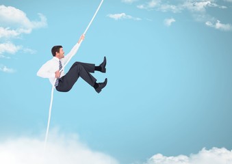 Man swinging on rope