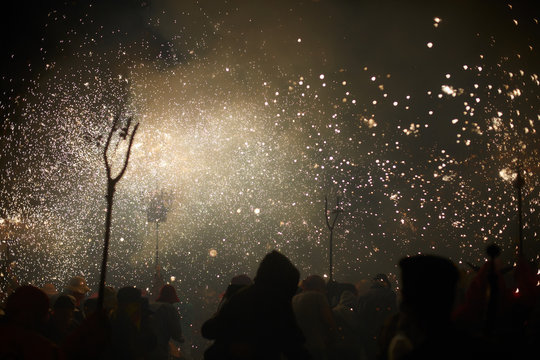 Spark rain in a crowded fire parade
