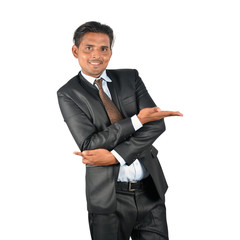 Obraz na płótnie Canvas Businessman in black suit happy pose over white background