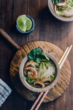  Bowl of Asian Noodle Soup with chopsticks