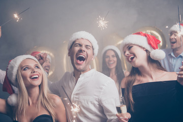 Dance club event, sparkling wine. Festive youth crowd on luxury feast, well dressed, in classy outfits, so glamorous and fancy! Relax disco funky mood, celebrating newyear in traditional headwear