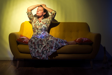 Woman on a yellow sofa serie