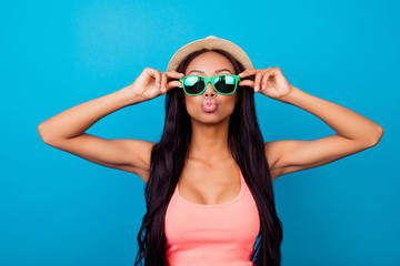 Carefree gorgeous dreamy traveller in trendy beige head wear sends air kiss, so hot, fit and slim. Relax, rest, chill mode! Plastic surgery procedure, plump, shape, botox, fillers, injection, lifting © deagreez