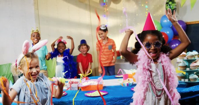 Kids having fun during birthday party 