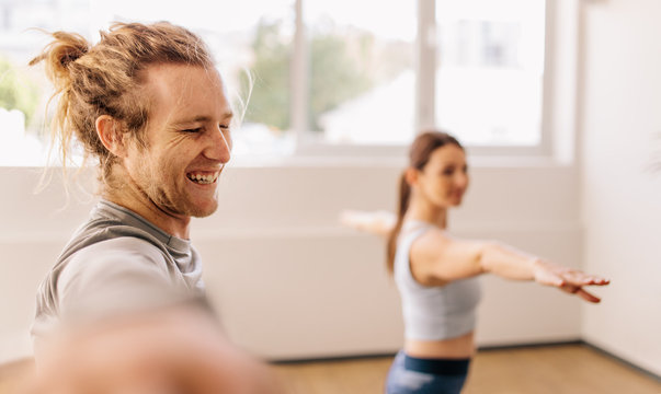 Yoga instructor and student