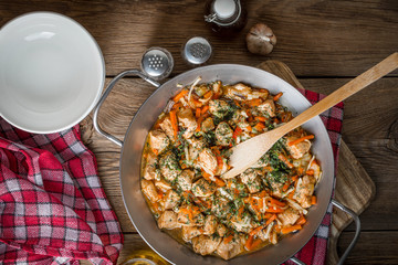 Fried chicken pieces with vegetables.