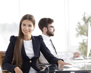 young business woman sitting at Desk