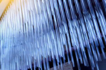 Abstract background with blue glass tubes