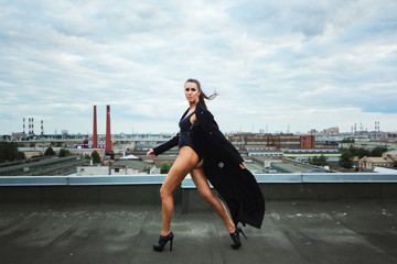 Fashionable woman on roof