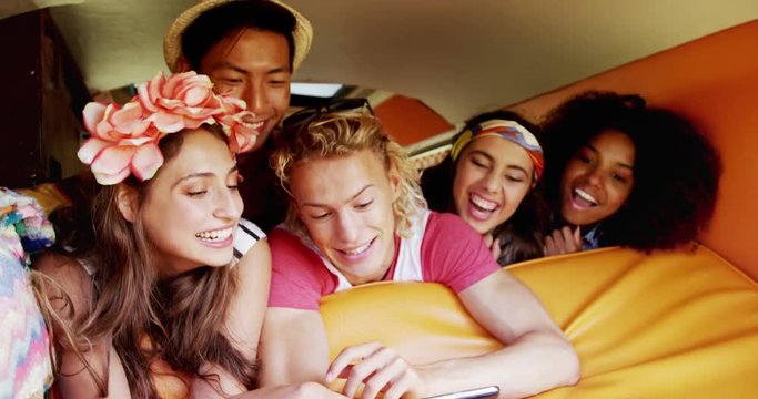 Happy friend taking selfie with mobile phone 