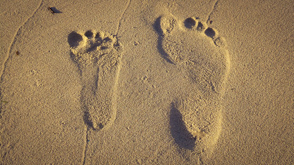 Fototapeta na wymiar Fußabdrücke im Sand